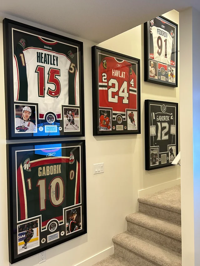 Custom T-shirt and jersey framing services in Al Quoz Dubai for sports memorabilia and signed shirts by Infinity Art & Frames